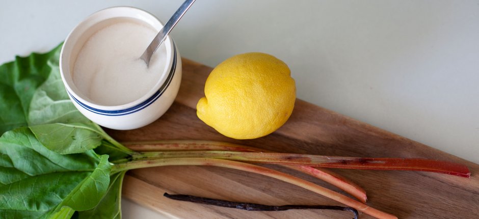 Rhubarb lemon vanilla sugar lying on a cutting board 