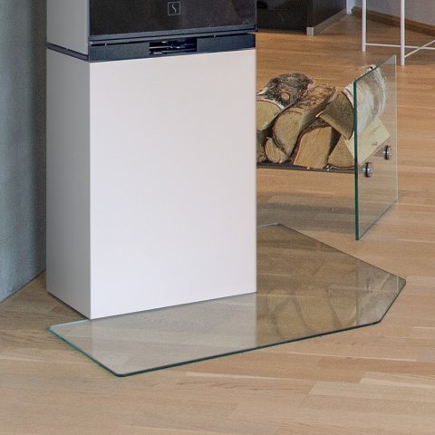 White wood-burning stove with form-fitting floor plate